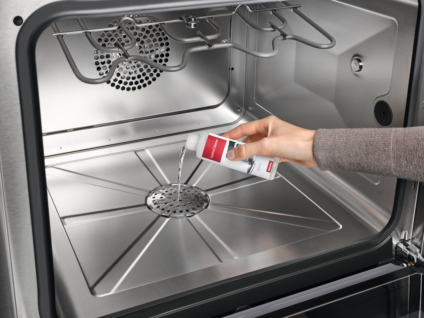 Set detergjent për vetëpastrim për furrat e kombinuara me avull HydroCleaner 4x - Miele